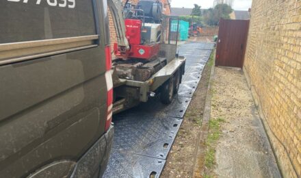 mini digger on trailer
